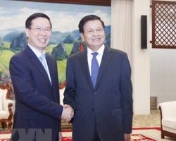Tổng bí thư, Chủ tịch nước Lào Thongloun Sisoulith tiếp ông Võ Văn Thưởng khi ông trên cương vị Thường trực Ban Bí thư hồi tháng 7-2022 - Ảnh: TTXVN