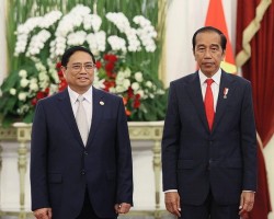Thủ tướng Phạm Minh Chính trong cuộc gặp Tổng thống Indonesia Joko Widodo - Ảnh: DƯƠNG GIANG