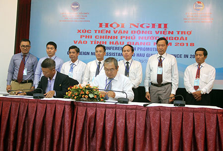 Signing MOU between Haugiang Union of Friendship organizations and Activity International