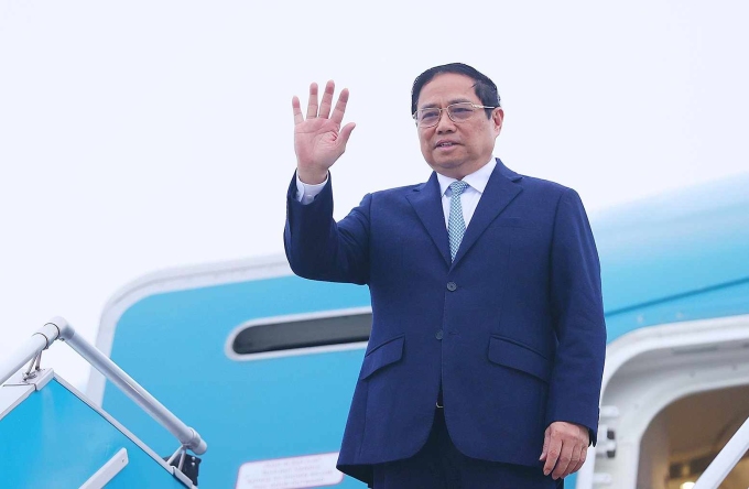 Thủ tướng Phạm Minh Chính tại sân bay Nội Bài, lên đường sang Nhật Bản, sáng 15/12. Ảnh: Dương Giang
