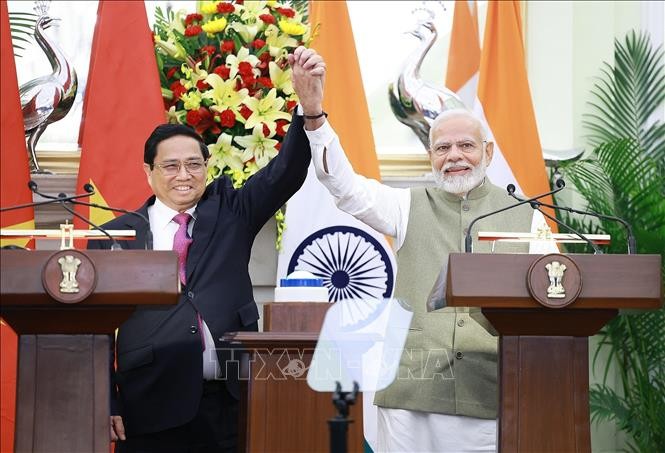 Thủ tướng Phạm Minh Chính​ và Thủ tướng Ấn Độ Narendra Modi tại cuộc gặp gỡ báo chí hai nước. Ảnh: Dương Giang/TTXVN